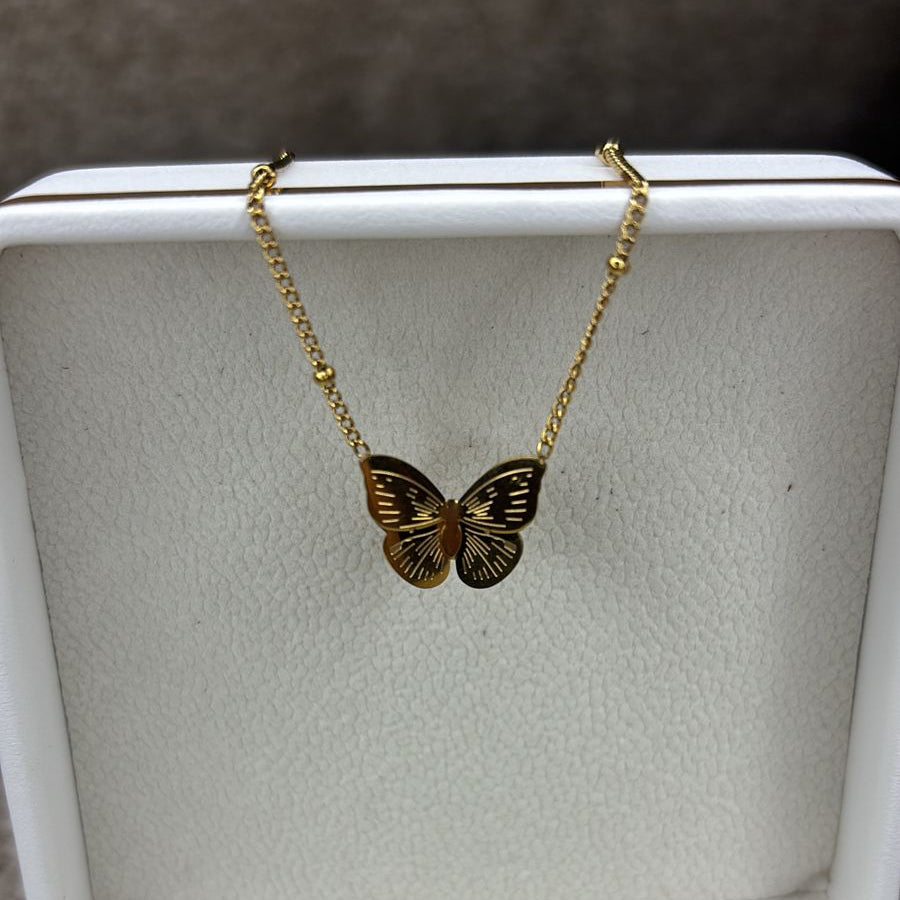 collier papillon doré 🦋